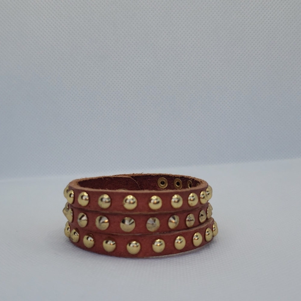 Leather and gold studded bracelet